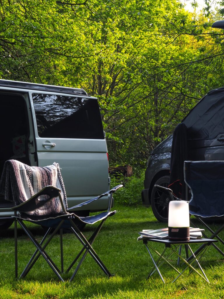 Luna and Willow VW campervan parts with chairs and camping light Roam VW Campervan hire